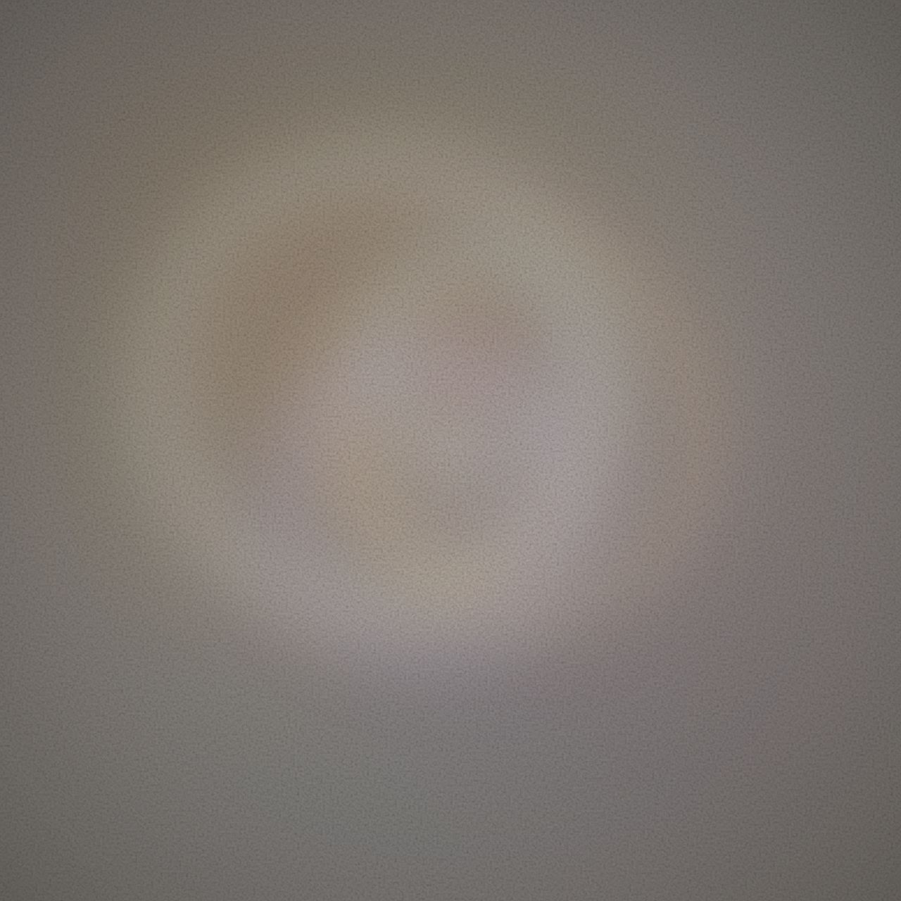 Warm grey field with amber and mauve blobs. A long tilted bar of pale warm light crosses the lower third.