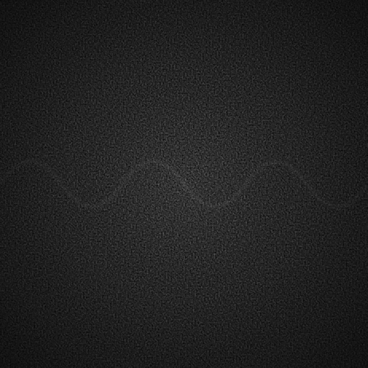 Dense static field, a faint sine wave signal barely visible through the noise.